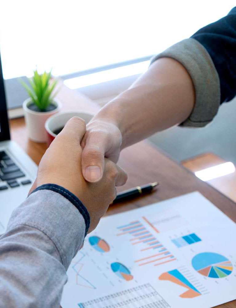 Thanks Federal contracting specialists shaking hands with U.S. government contractor/small business owner.