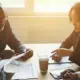 Federal Contracting Center consultant offers guidance on FAR regulations to a business owner. FAR regulation support at FCC.