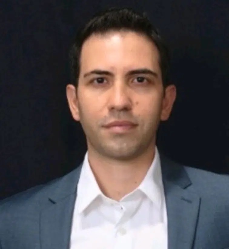 Professional headshot of Niko Nicolaou, M.D., a diagnostic pathologist specializing in complex disease management in New York.