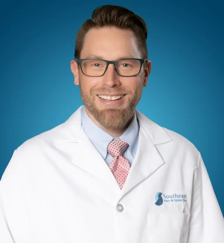 Headshot of Dr. Troy Gingerich, MD, a board-certified pain management and anesthesiologist specialist in Charlotte, NC.