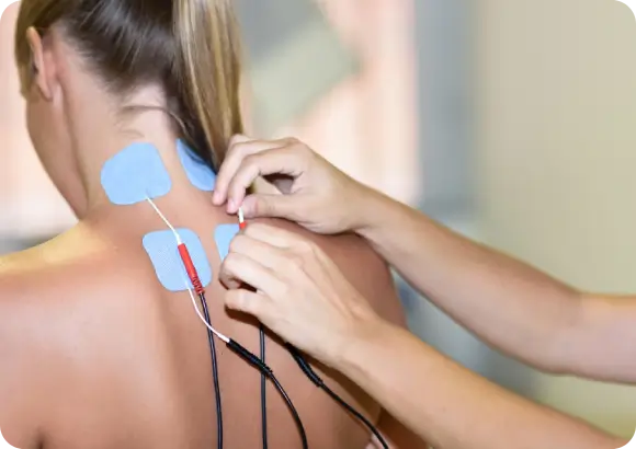 Specialist performing EMG test to diagnose nerve pain and muscle disorders
