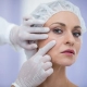 A female patient with surgical markings on her face during a facelift consultation with a Hawaii facial plastic surgeon.