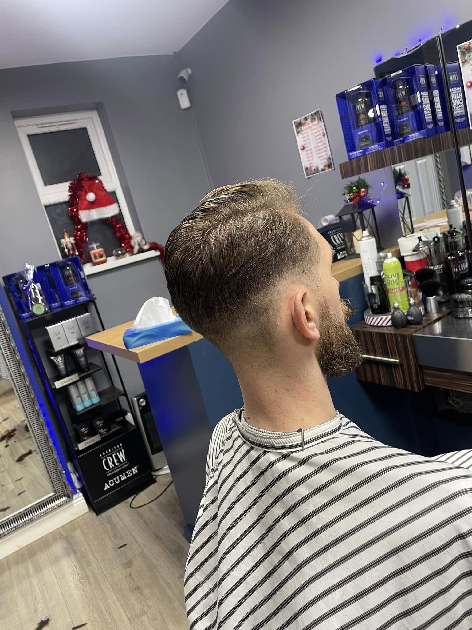 A clean fade haircut finished at Studio 28